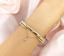 Load image into Gallery viewer, DIAMOND AND BLUE SAPPHIRE EYE CHAIN BANGLE - MICHAEL K. JEWELERS